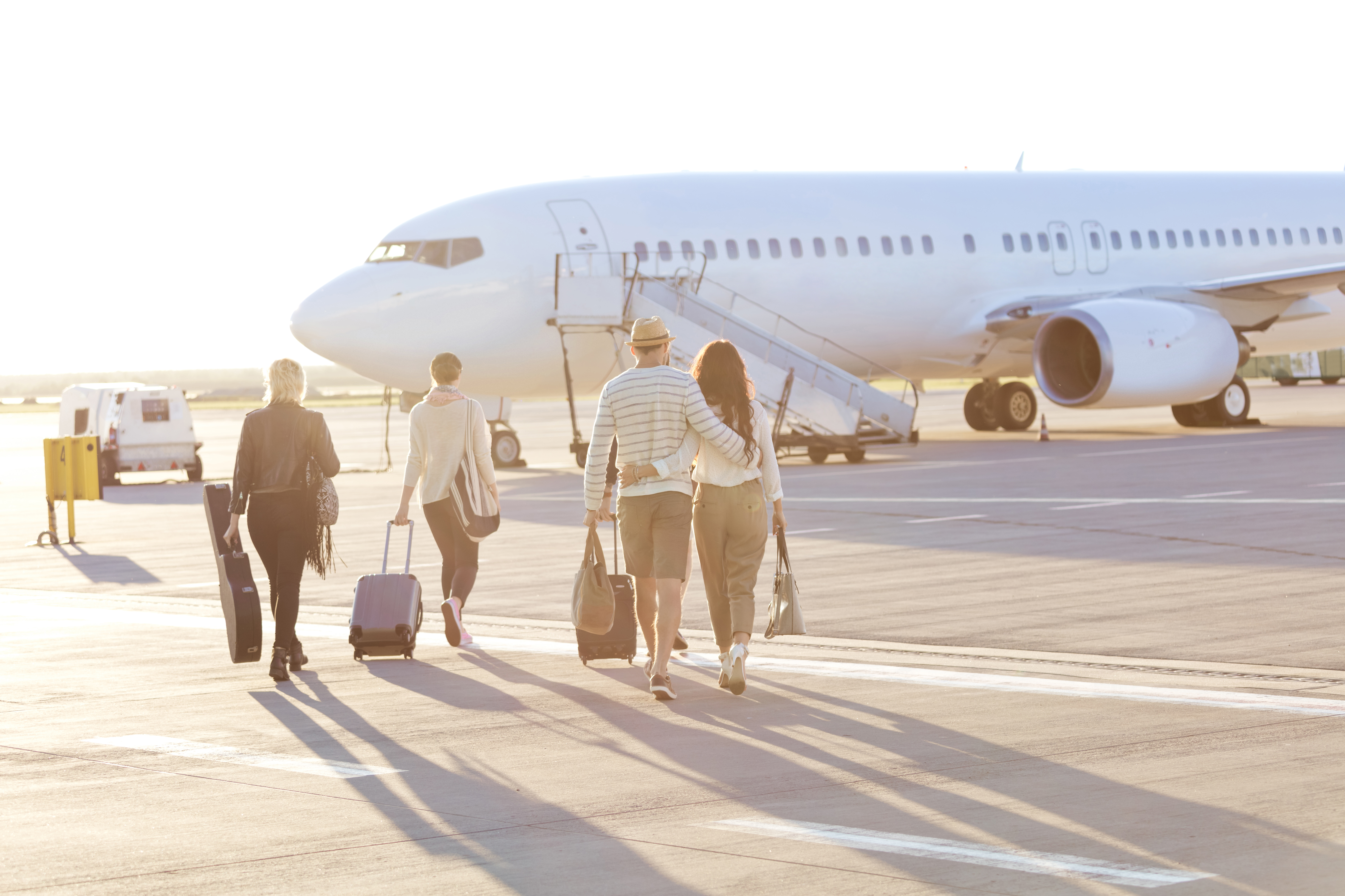 Airport Passengers Walking To Plane